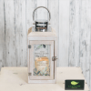 Wooden memorial lantern with a metal handle and printed sympathy message