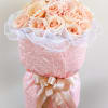 2 dz. Blush roses arranged in a 6"x6" glass cylinder vase and