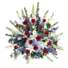 Large bouquet of red roses, white lilies, and blue flowers