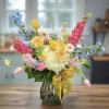Invite a breath of fresh air and effortless beauty with this charming