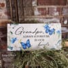Decorative sympathy plaque with blue butterflies and white flowers