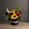 Black and white ceramic vase filled with hydrangea, scabiosa, roses, sunflowers, Billy