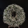 An elegant and gorgeous standing spray made of babybreath. 