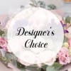 Pastel bouquet with pink and white flowers and eucalyptus, overlaid with "Designer's Choice" text