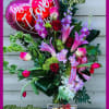 Mixed bouquet with heart-shaped love balloon and a box of chocolates