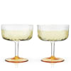 Draping glass and polished gold details give this stemmed glassware set Jazz