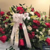 red roses, white lily's, white snaps, white Monte and red alstro