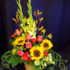 Cost effective basket arrangement of Colorful flowers for a Celebration of Life