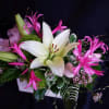 Whimsical variety of flowers for any occasion. A pleasing combination including greens