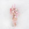 Pink dried flower bouquet wrapped with twine