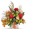 This arrangement of fall colors will be a lovely accent to your