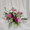 Pink and white mixed flower arrangement in a white vase