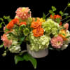 This arrangement is inspired by the dramatic colors of autumn. Helleborus with
