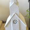 White decorative church figurine with a tall steeple