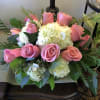 Pink roses and hydrangeas
 12 beautiful pink roses  with white hydrangeas