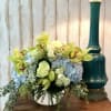 Bountiful Orchids includes a lovely mix of blue hydrangea, green cymbidium orchids