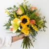 Bring sunshine and elegance together with our Golden Garden&trade; Hand-Tied Bouquet. Designed