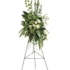 Peaceful white roses and gorgeous green hydrangea create an unforgettably elegant spray