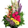 A Beautifully artistic display of flowers arranged in a European influenced design.