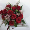 Twelve long stemmed roses in your choice of color with the works.
Please
