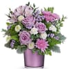 Experience the enchantment of blooms delivered! Purple roses in a polished gem