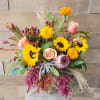 A Beautiful fall design, with an airplant keepsake.  Upright shape.