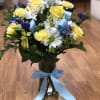 Yellow roses and white daysis blue dslfin and purple sratic