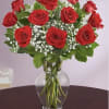 12 red roses with babys breath 