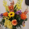 yellow sunset orange roses Peruvian lilies (alstroemerias) sunflowers snapdragons and lavender phlox
