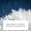 White winter centerpiece with frosty, feathery texture against a blue background