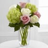 The Embracing Grace Bouquet captures the essence of elegance and beauty with