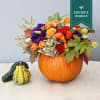 What better container than a pumpkin for this time of the season?!