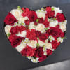 Beautiful imported roses, spray roses wax, and carnations beautifully designed in a
