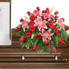 Stargazer lilies and red roses create a stunning display!
Copyrighted content provided by