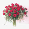 Bouquet of red roses in a clear glass vase