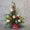 Red and white roses arranged in a red vase with "i love u" text