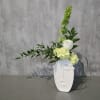 Elegant simplicity meets artistic flair in our "Amelia" Arrangement. This design features