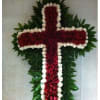 Cross-shaped floral arrangement of red and white roses