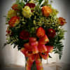 We choose a variety of colors of roses and arrange them in