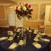 The centerpieces done with the different color of the Roses a different