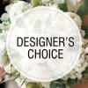 White floral bouquet with a "Designer’s Choice" label
