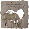 Stone memorial plaque with a horse and engraved text