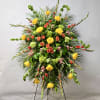 This Standing Spray Includes Orange Gladiolas, Yellow Roses, Light Pink Snapdragons, Bells