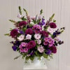 A Designers Choice Assortment of Fresh Cut Flowers Arranged in a Mortuary