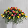 This Casket Spray Includes Green Cymbidium Orchid Blooms, Purple Dendrobium Orchids, Yellow