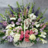 Large mixed flower basket with pink, white, and purple blooms