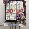Custom bingo wreath using white carnations, accented with assortment of lavender flowers.