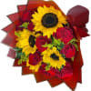Bouquet of red roses and yellow sunflowers wrapped in red paper