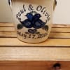 Ceramic planter with blue bird design and the names Paul & Olivia