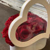 Heart Shaped box filled with roses. Box colors to choose from: red/whit.
Rose